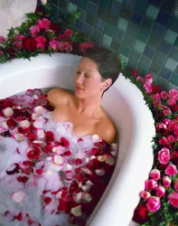 Bath with rose petals photo