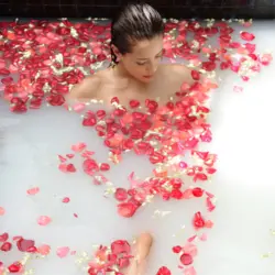 Bath with rose petals photo