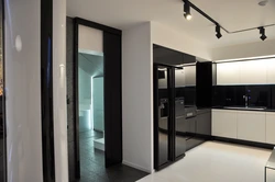 White Kitchen Black Refrigerator Photo