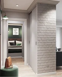 Hallway with white bricks photo