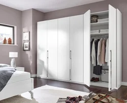 Gray wardrobe in the bedroom photo