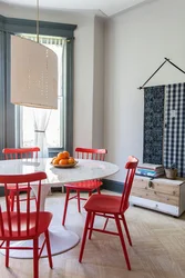 Kitchen interior with red chairs