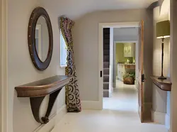 Round mirrors in the hallway interior photo