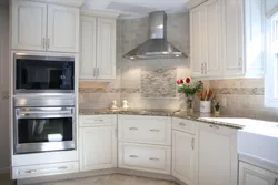 Photo of a kitchen with a corner hood