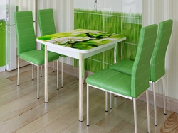 Photo Of A Kitchen With Green Chairs