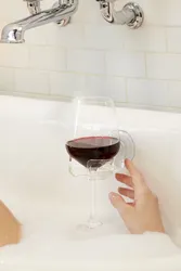 Photo with a glass in the bathroom