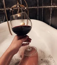Photo with a glass in the bathroom