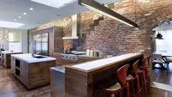 Photo Of A Kitchen Made Of Wood And Brick