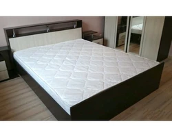 One and a half beds with mattress photo