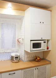 Kitchen in Khrushchev with microwave photo