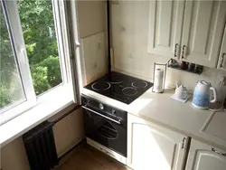 Stove by the window in the kitchen photo