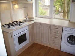 Stove by the window in the kitchen photo