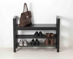 Shoe rack in the hallway made of wood photo