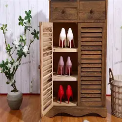 Shoe Rack In The Hallway Made Of Wood Photo