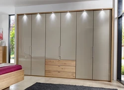 Photo of a bedroom closet up to the ceiling