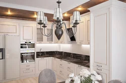 Light kitchen design with dark apron