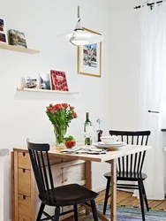 How to arrange a table in the kitchen photo