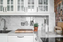 White kitchen with marble splashback photo