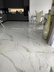 Marble-effect porcelain tiles on the kitchen floor photo