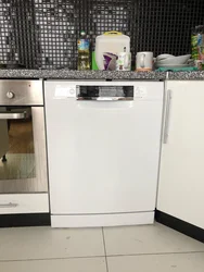 Freestanding dishwasher in the kitchen photo