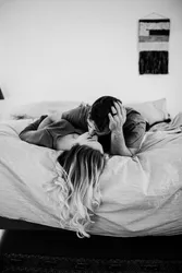 Photo of couple in bedroom
