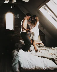 Photo of couple in bedroom