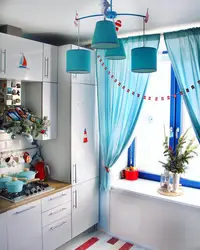 Интерьер кухни с бирюзовыми шторами фото
