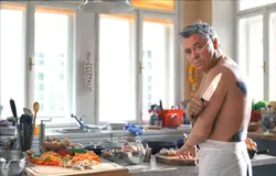Men In An Apron In The Kitchen Photo