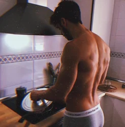 Beautiful men in the kitchen photo