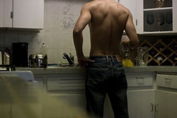 Beautiful men in the kitchen photo
