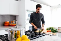 Beautiful men in the kitchen photo