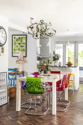 Kitchen with colored chairs photo