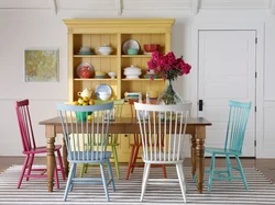 Kitchen with colored chairs photo