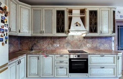White kitchen with patina photo