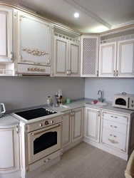 White kitchen with patina photo