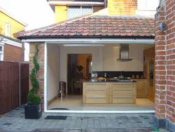 Photo of a garage with a summer kitchen