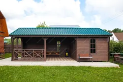 Photo of a garage with a summer kitchen