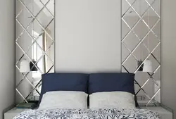 Mirror wall in the bedroom interior photo