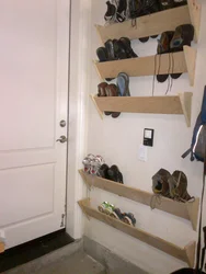 Shelving in a narrow hallway photo