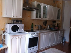 Kitchen With A Regular Stove Photo