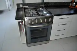 Kitchen With A Regular Stove Photo