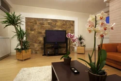 Artificial flowers in the living room interior photo