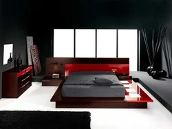 Интерьер спальни с красной кроватью