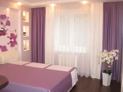 Colored curtains in the bedroom interior photo