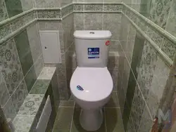 Design of a toilet with a box in an apartment