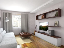 Design of a living room in an apartment with a window