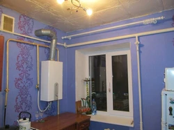 Gas pipe under the ceiling in the kitchen photo