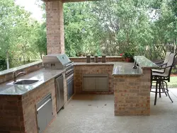 Cottage kitchen made of brick photo