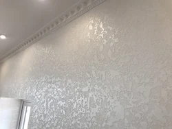 Textured plaster for walls in an apartment photo