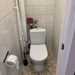 Budget finishing of a toilet in an apartment photo
